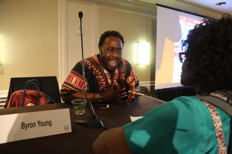 Dr. Byron Young, a child psychiatrist, speaking with audience members at the NAN conference on April 18, 2018.